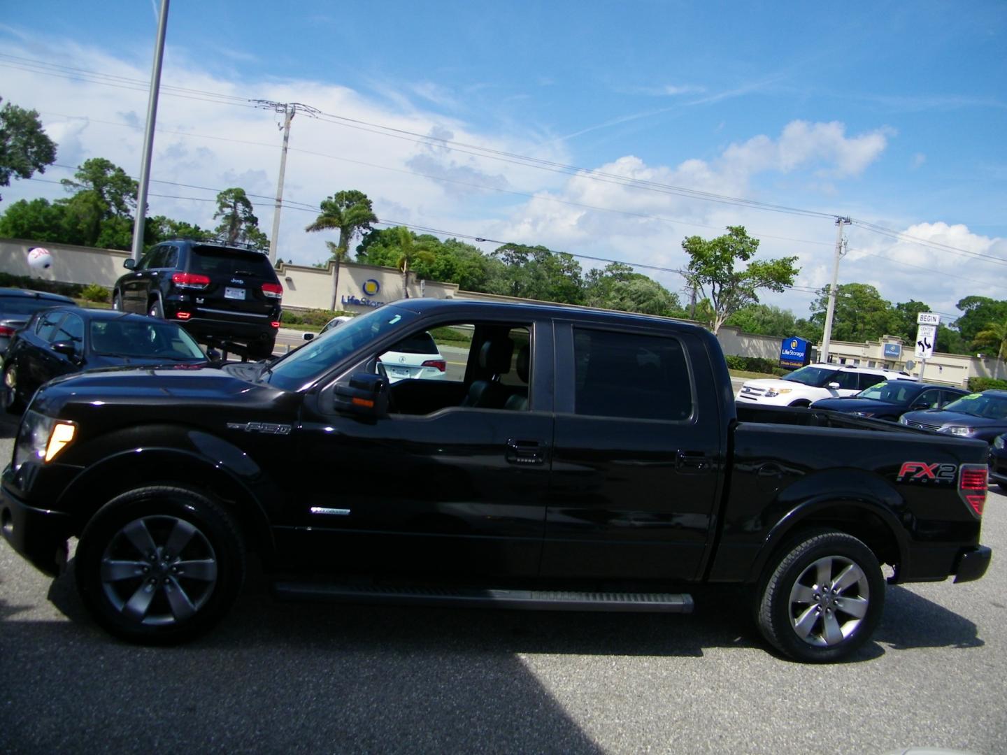 2012 Black /Black Ford F-150 Platinum SuperCrew 6.5-ft. Bed 2WD (1FTFW1CT9CK) with an 3.5L V6 TURBO engine, 6-Speed Automatic transmission, located at 4000 Bee Ridge Road, Sarasota, FL, 34233, (941) 926-0300, 27.298664, -82.489151 - Photo#2